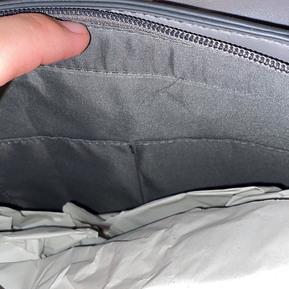 Purse with bow design on front. Brand new with tag. Gray purse. - Picture 15 of 16